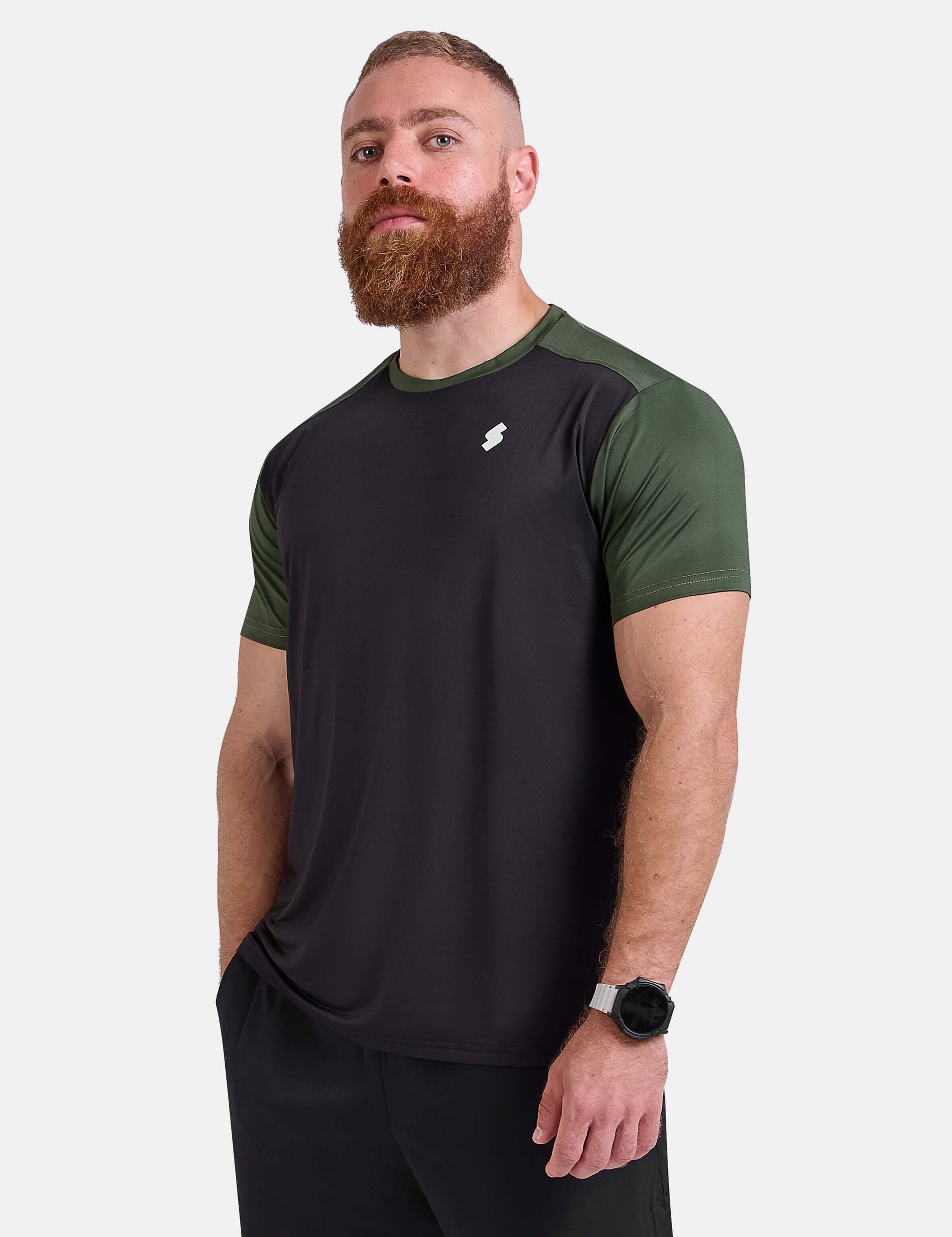 Man wearing black and green sports - gym - padel t-shirt by KAF Egypt