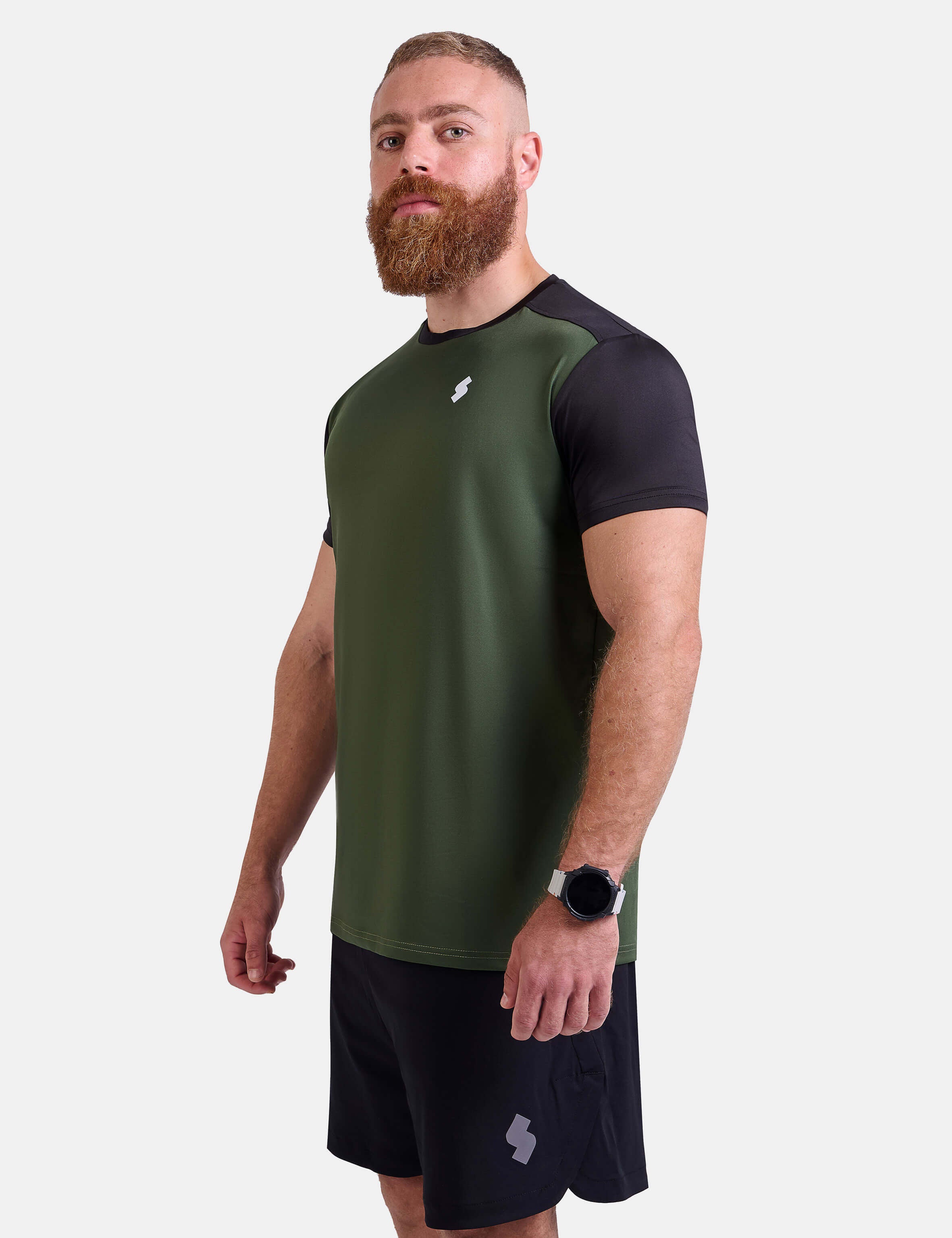 Man wearing black and green sports - gym - padel t-shirt by KAF Egypt