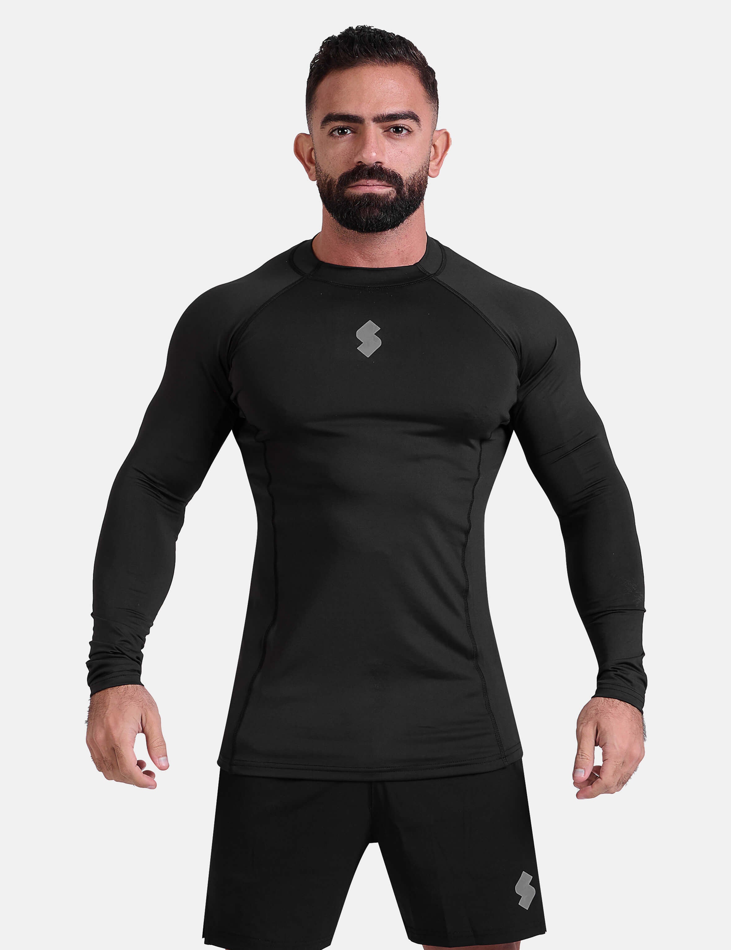 Man wearing black sports & gym rashguard shirt by KAF 