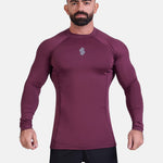 Man wearing burgundy sports & gym rashguard shirt by KAF 