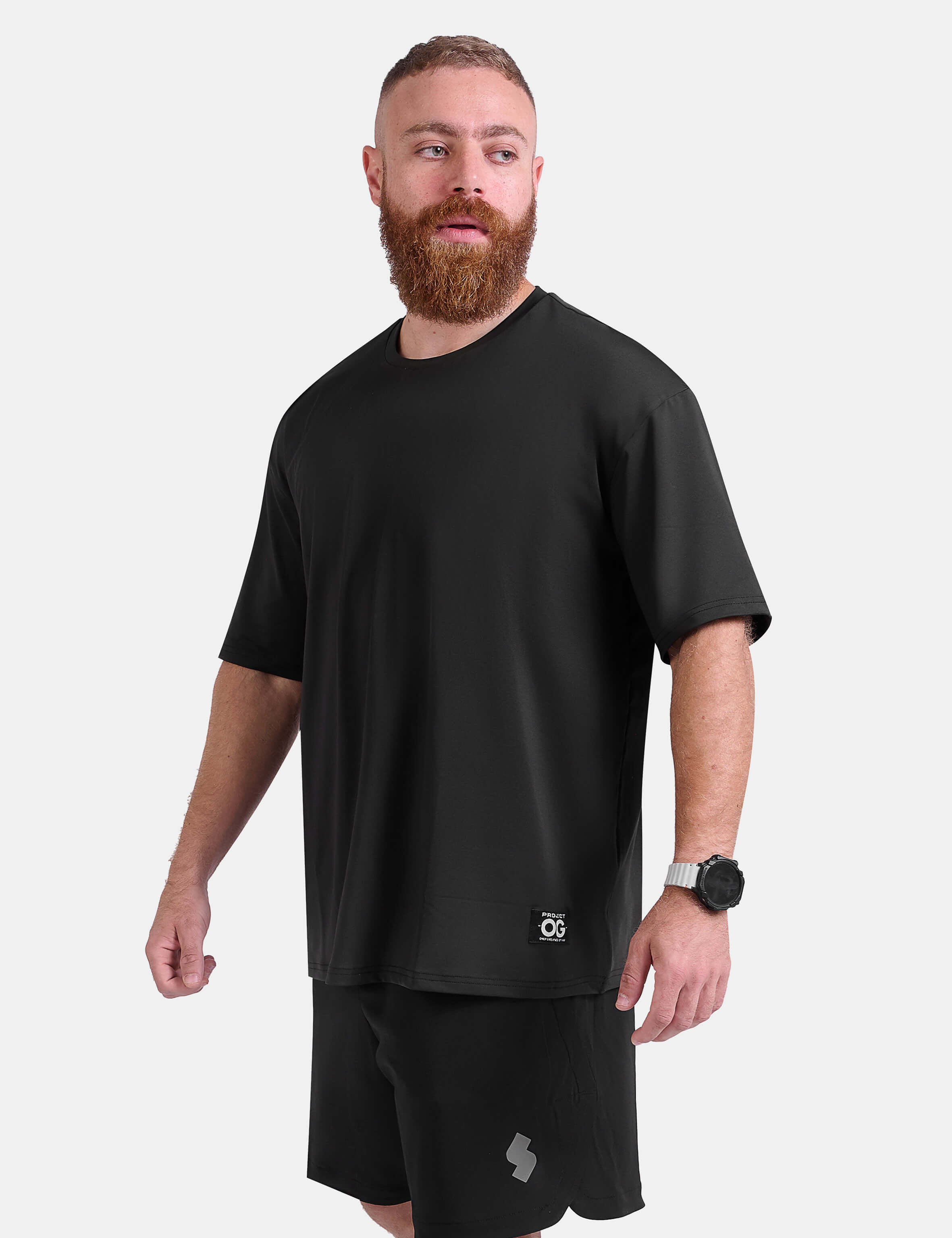 Man wearing black oversized sports & gym shirt by KAF 