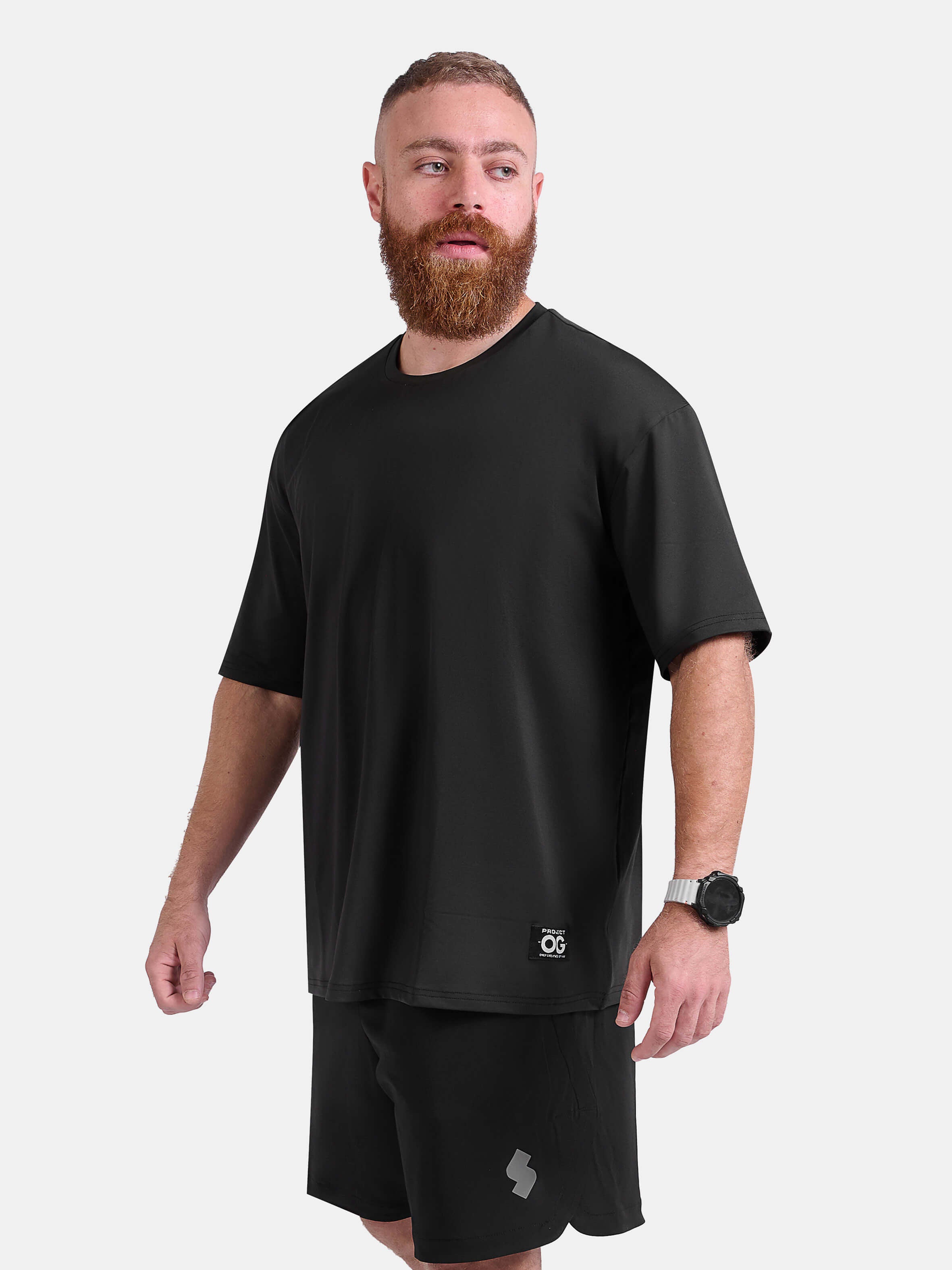 Man wearing black oversized sports & gym shirt by KAF 