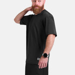 Man wearing black oversized sports & gym shirt by KAF 