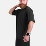 Man wearing black oversized sports & gym shirt by KAF 