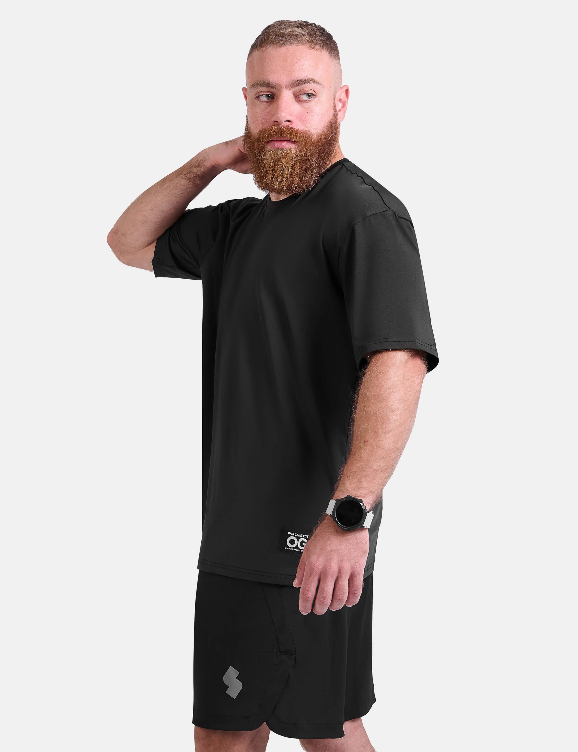 Man wearing black oversized sports & gym shirt by KAF 