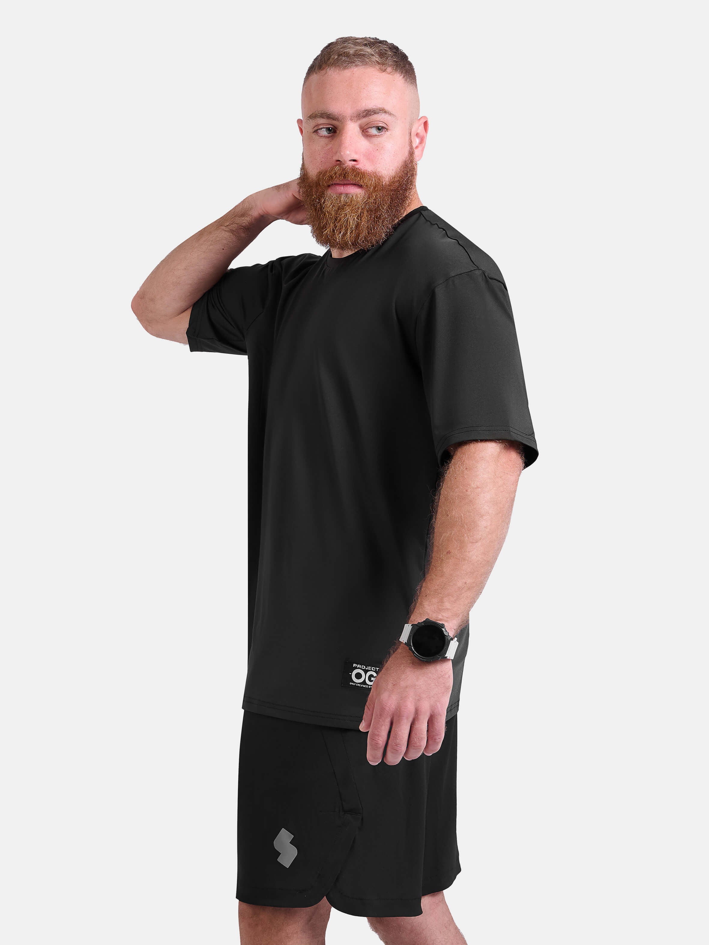 Man wearing black oversized sports & gym shirt by KAF 