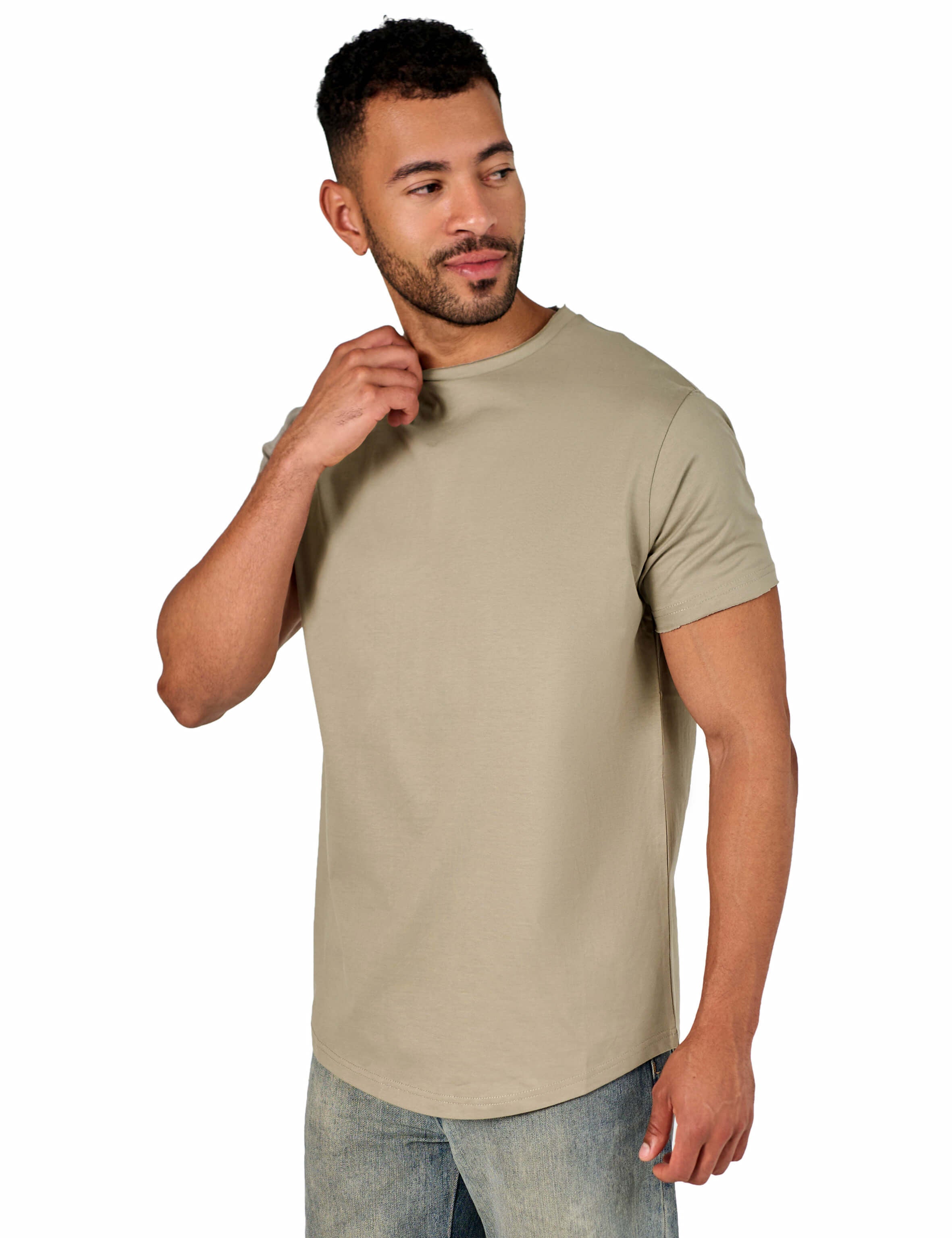 A male model wearing a raw-edged cotton crew neck t-shirt with short sleeves and a rounded hem.