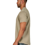 A male model wearing a raw-edged cotton crew neck t-shirt with short sleeves and a rounded hem.