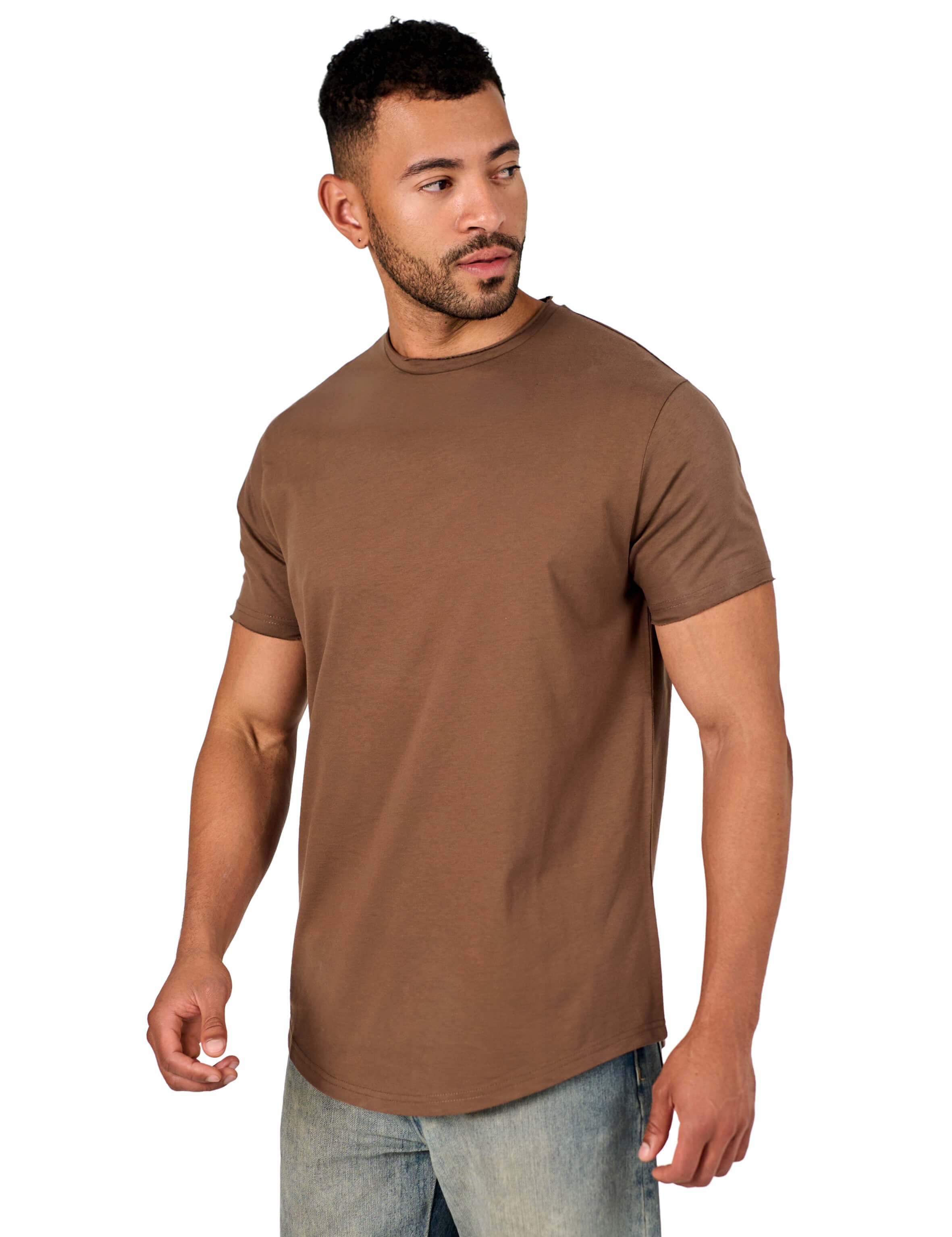 A male model wearing a raw-edged cotton crew neck t-shirt with short sleeves and a rounded hem.