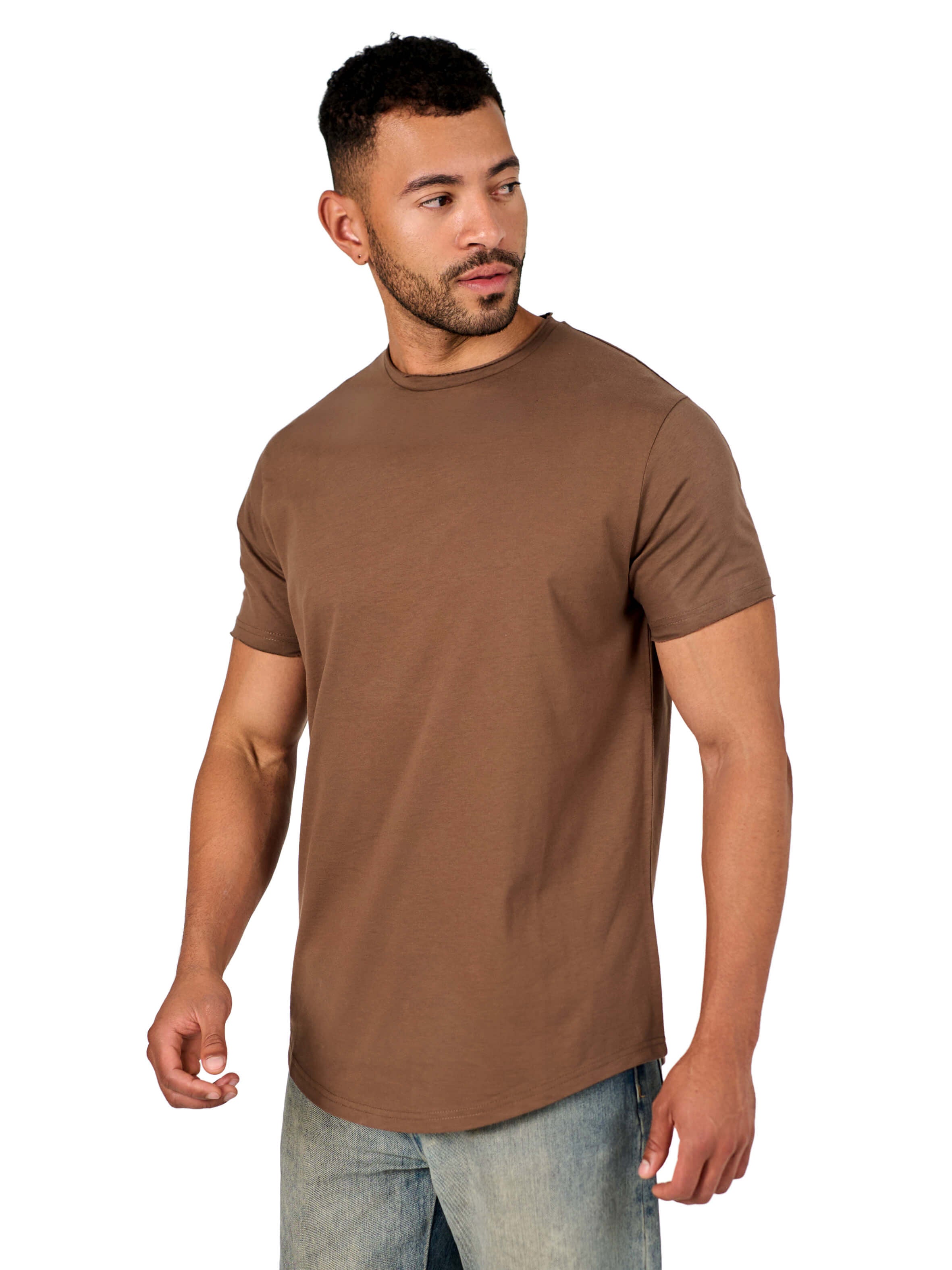A male model wearing a raw-edged cotton crew neck t-shirt with short sleeves and a rounded hem.
