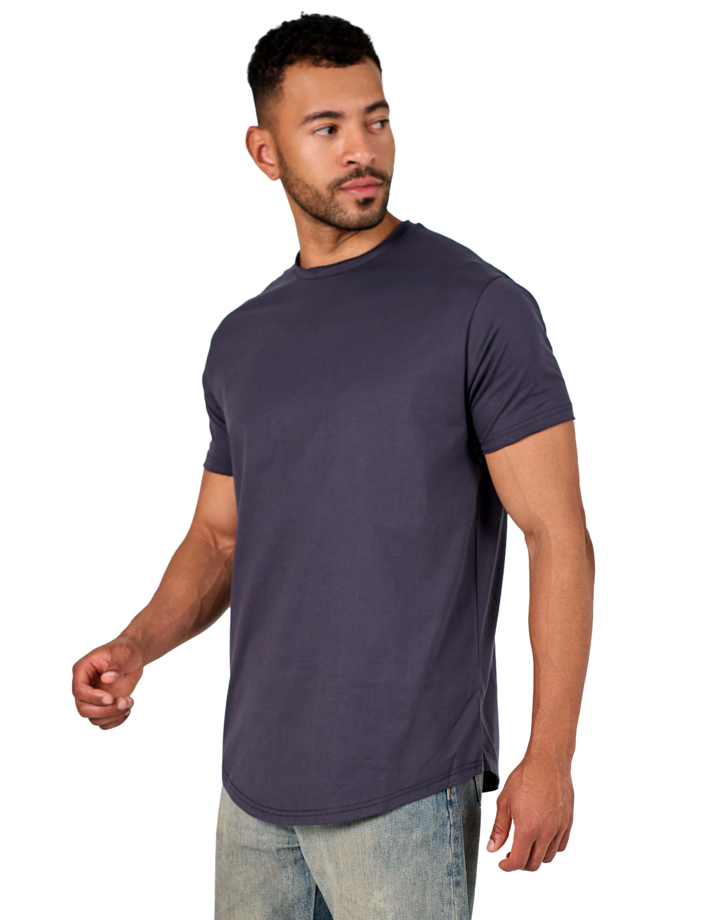 A male model wearing a raw-edged cotton crew neck t-shirt with short sleeves and a rounded hem.