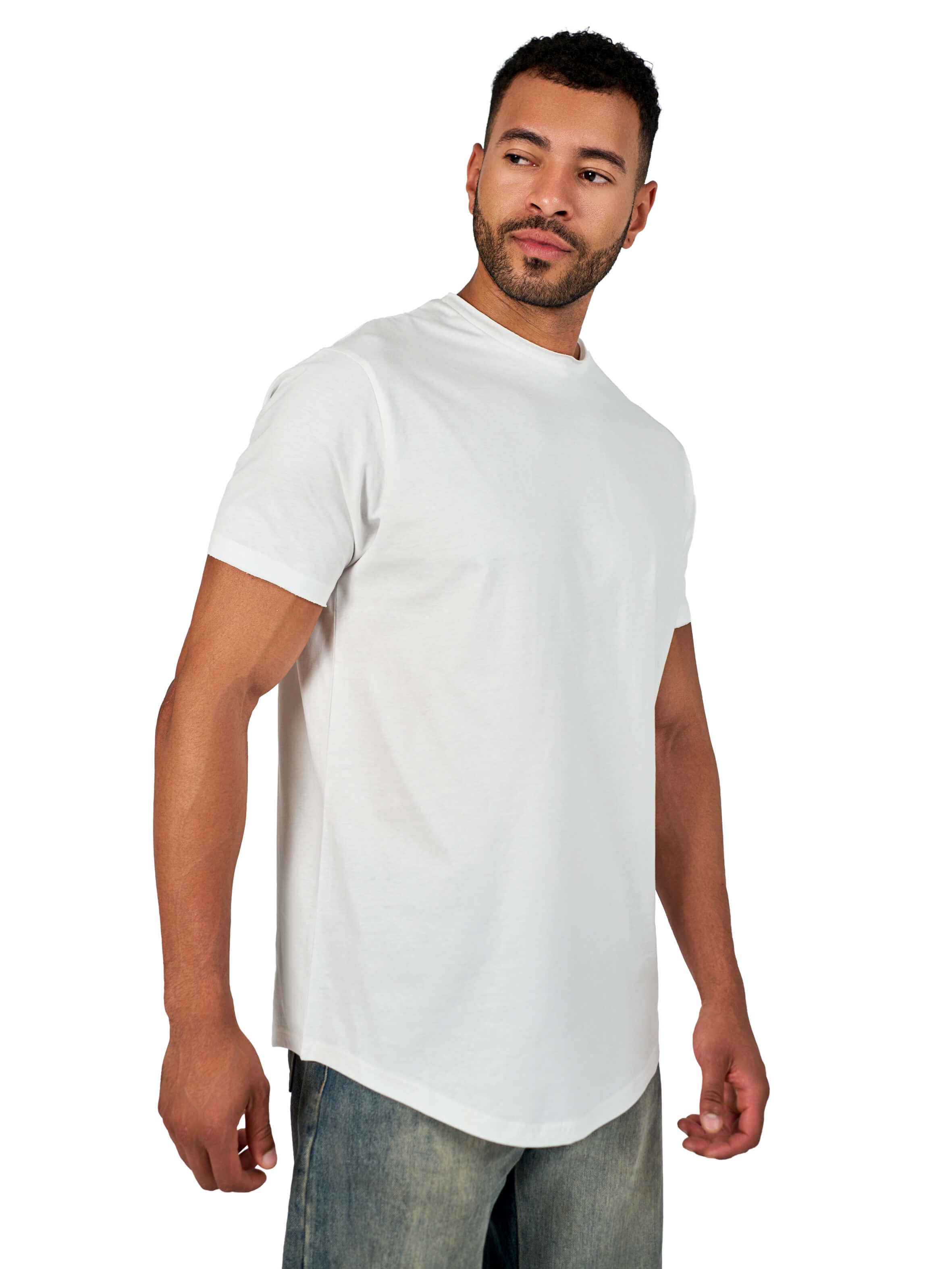 A male model wearing a white raw-edged cotton crew neck t-shirt with short sleeves and a rounded hem.