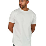 A male model wearing a white raw-edged cotton crew neck t-shirt with short sleeves and a rounded hem.