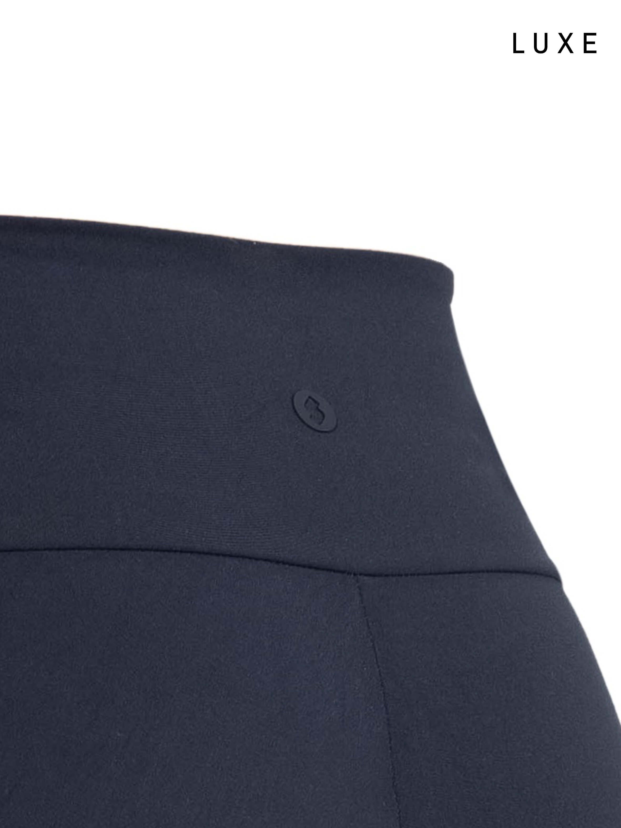 Navy blue sports activewear buttery-soft flared pants by KAF on a white background with 'LUXE' branding.