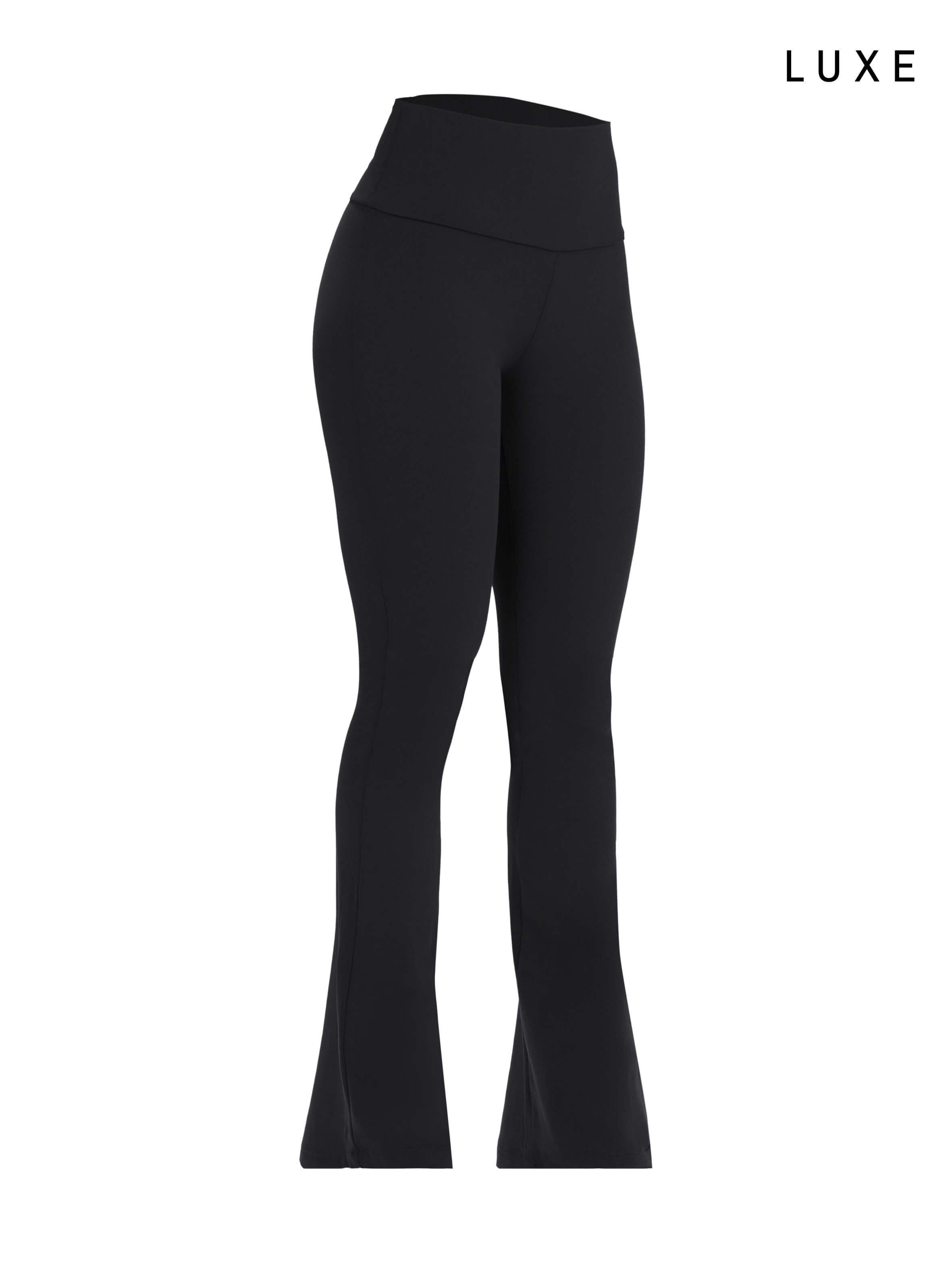Black sports activewear buttery-soft flared pants by KAF on a white background with 'LUXE' branding.