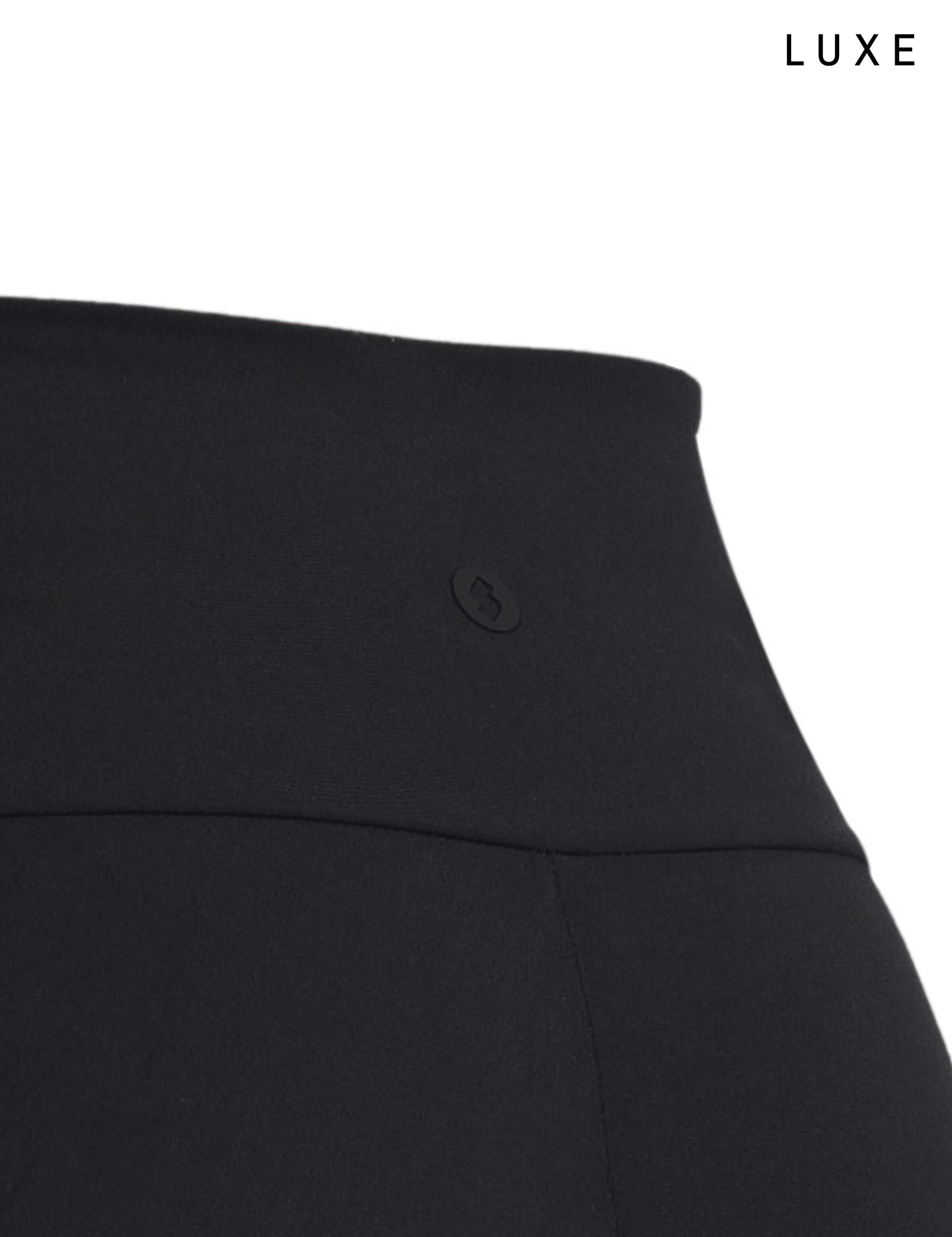 Black sports activewear buttery-soft flared pants by KAF on a white background with 'LUXE' branding.