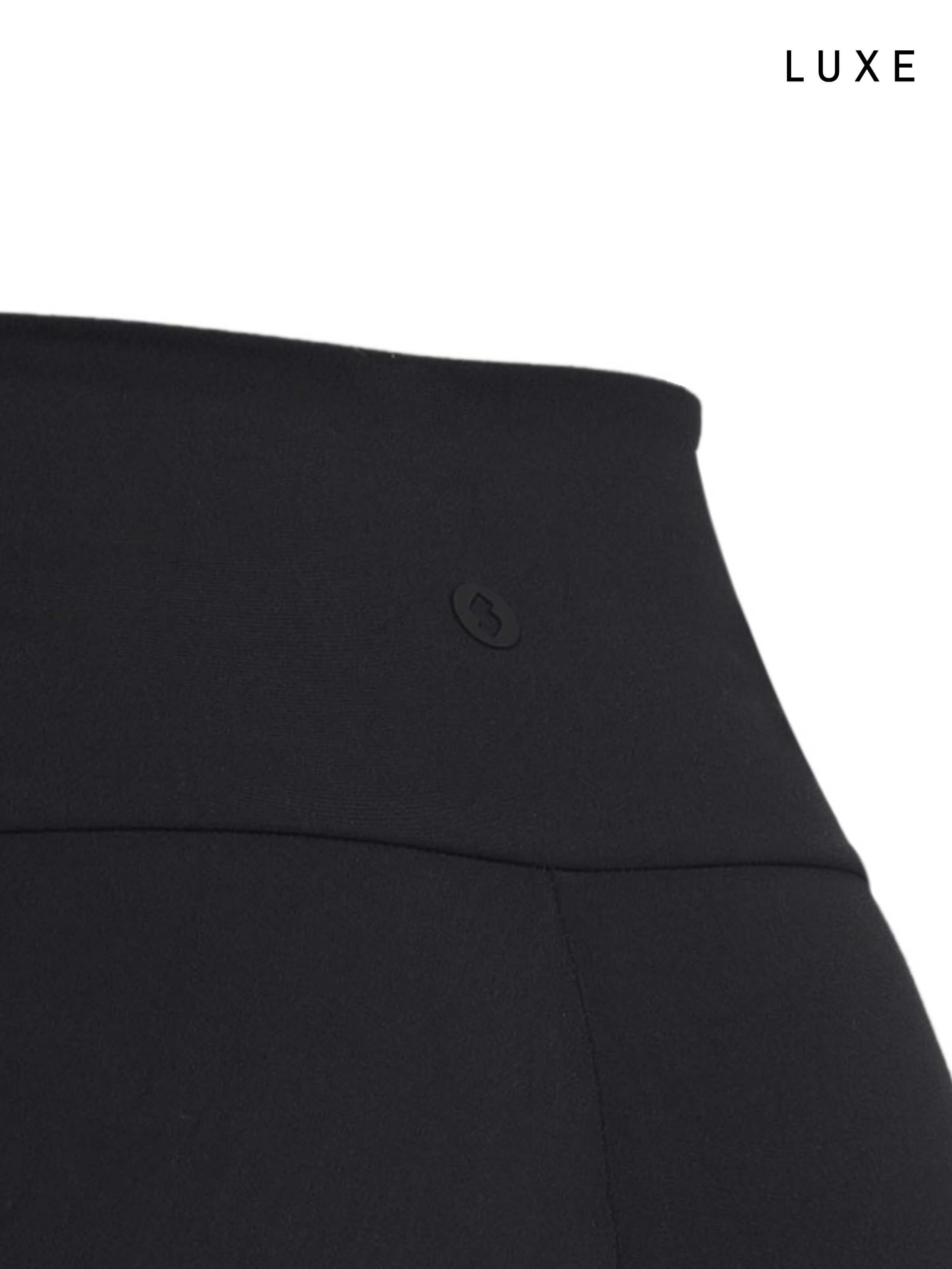 Black sports activewear buttery-soft flared pants by KAF on a white background with 'LUXE' branding.