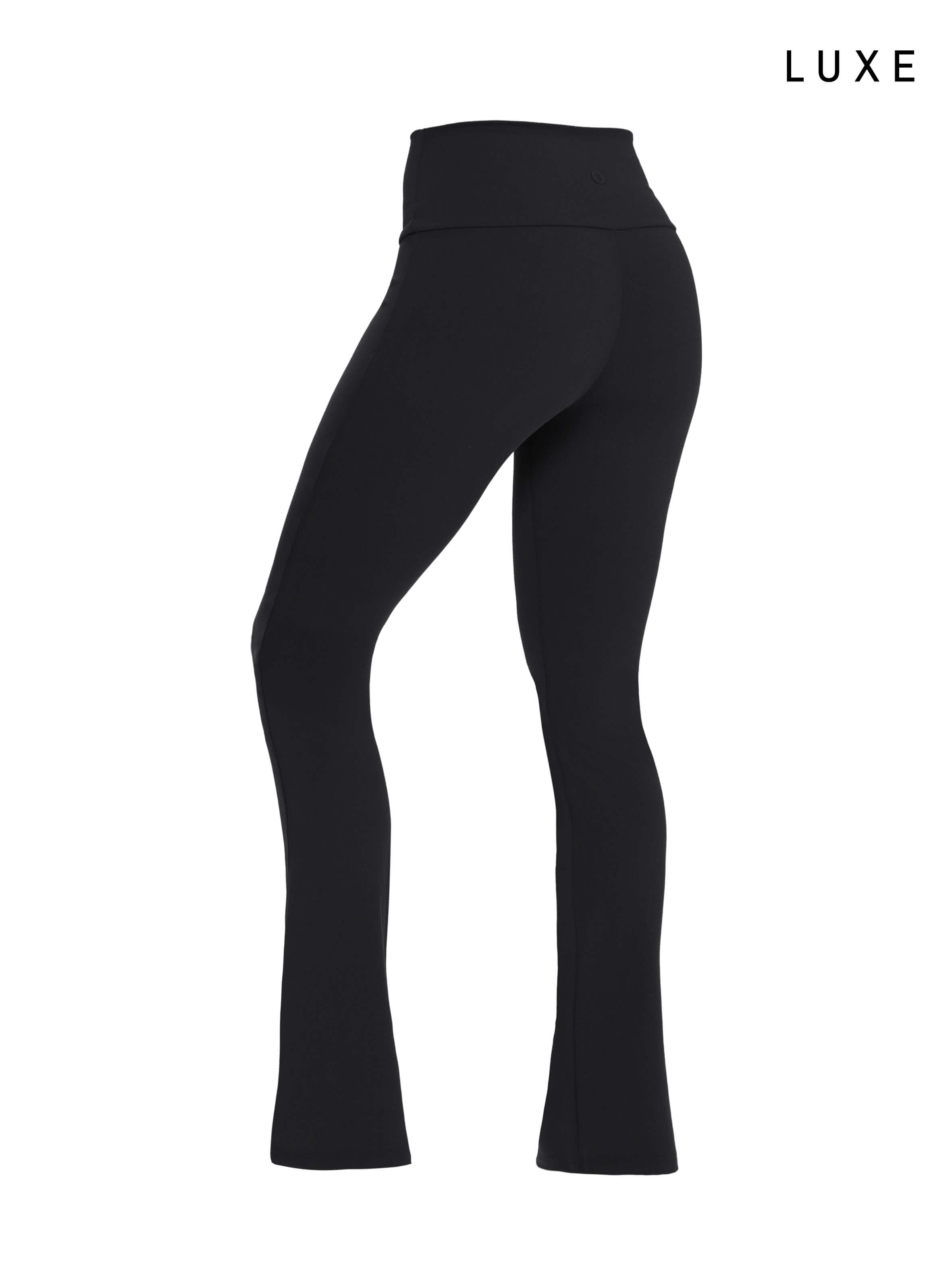 Black sports activewear buttery-soft flared pants by KAF on a white background with 'LUXE' branding.