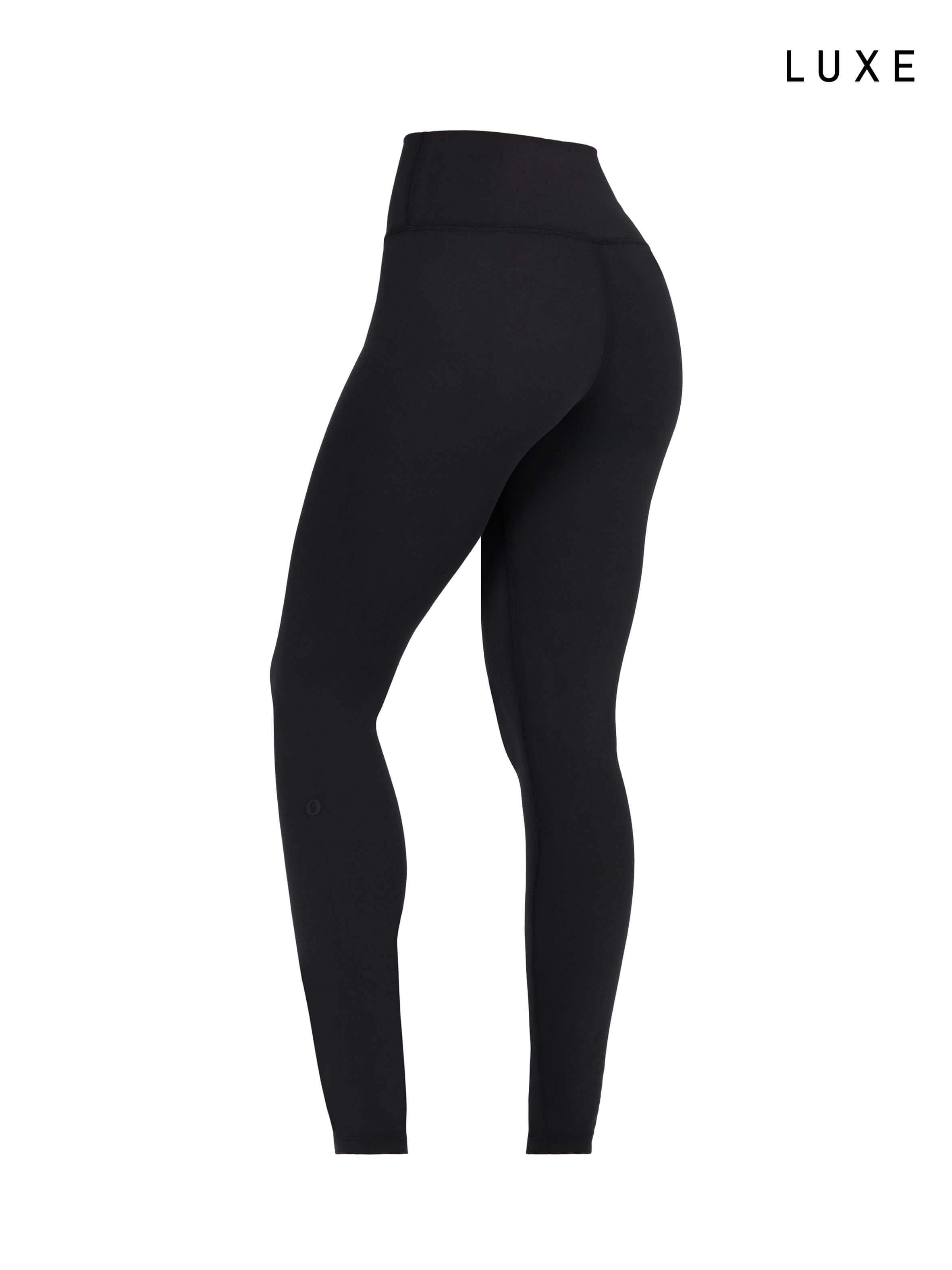 Black sports activewear buttery-soft leggings by KAF on a white background with 'LUXE' branding.