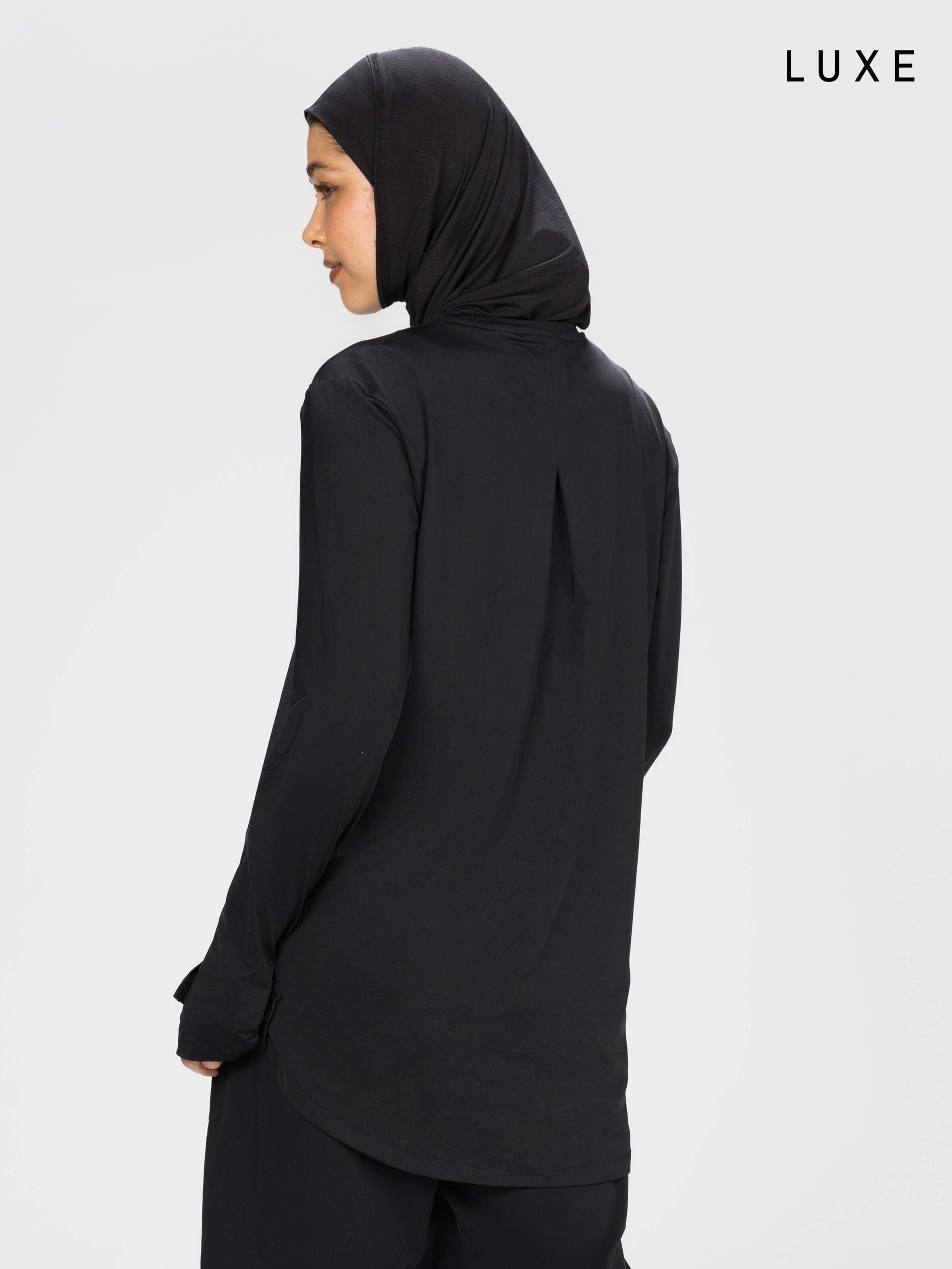 Women black long-sleeve modest sports activewear top by KAF